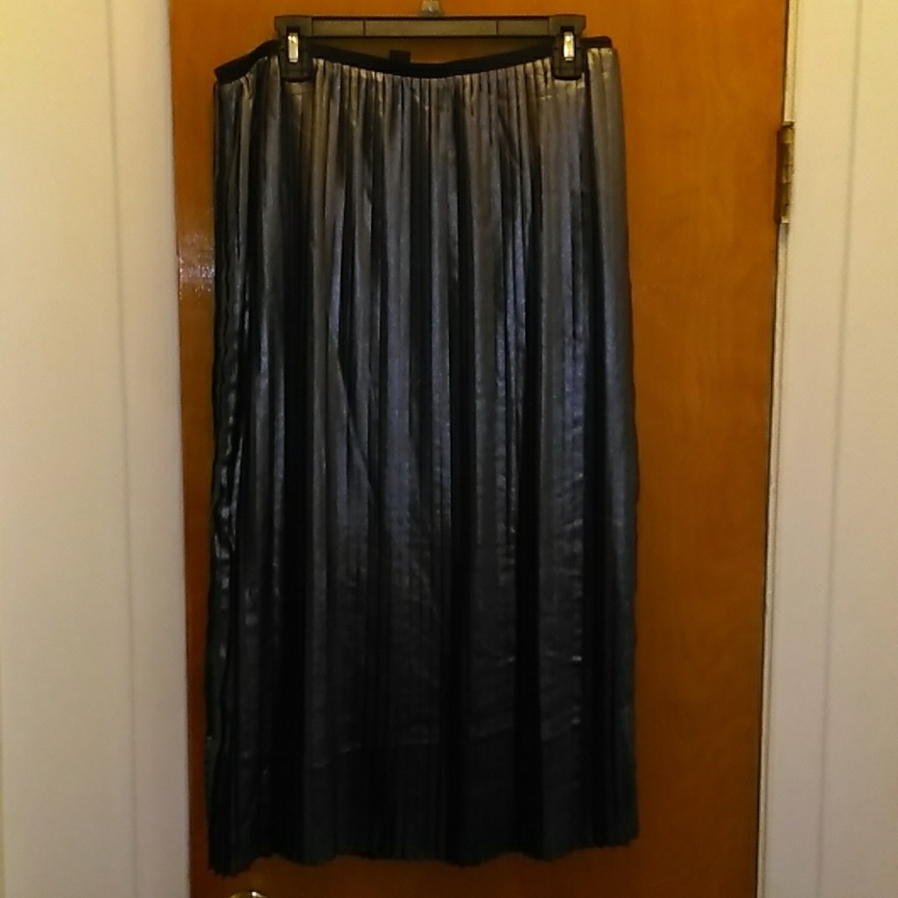 Metaphor. Long black and silver skirt metallic